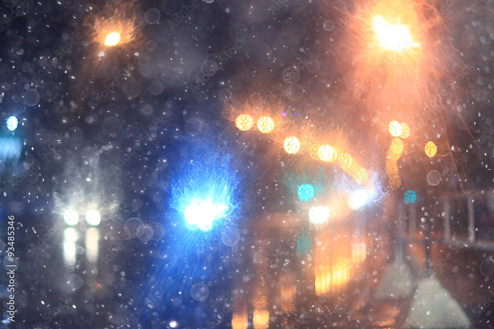 Obraz premium niewyraźne tło nocne światła miasta migające krople