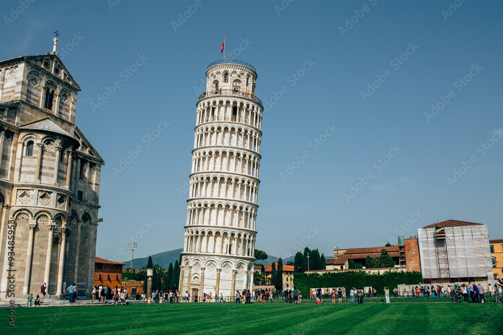 PISA, ITALY. Exterior views of the famous buildings of Leaning tower and Pisa cathedral in a summer day