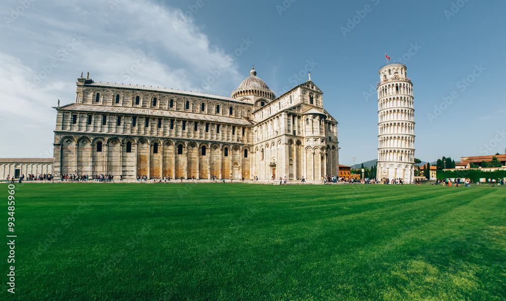 PISA, ITALY. Exterior views of the famous buildings of Leaning tower and Pisa cathedral in a summer day