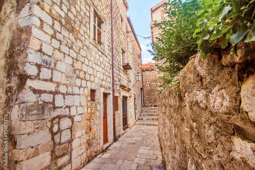 Narrow street and houses walls in the Old Town in Dubrovnik  Croatia 