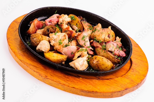 roasted meat with vegetables and potato