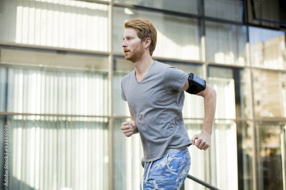 Young man running in the urban area Young man running in the urban area