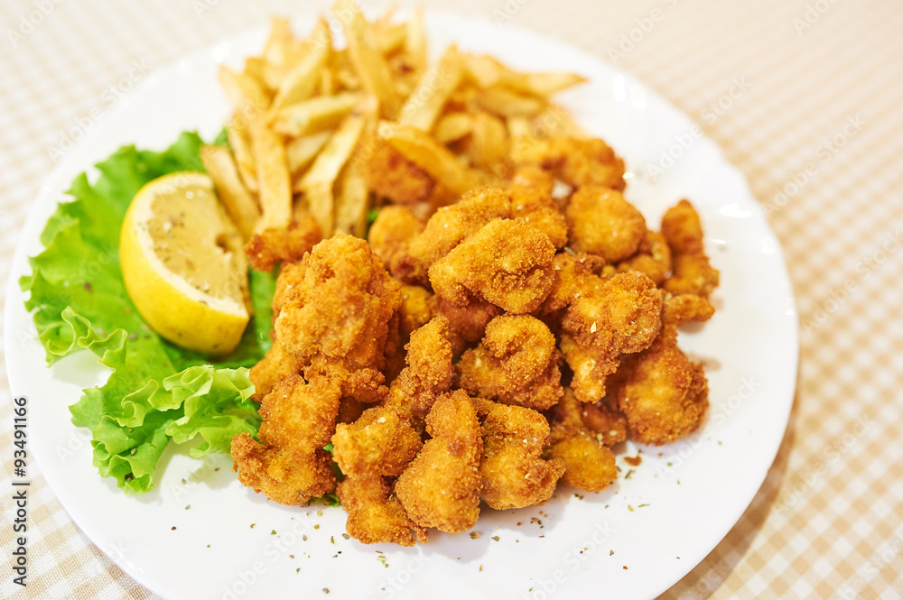 Fried Chicken Nuggets and French Fries Fried Chicken Nuggets and French Fries