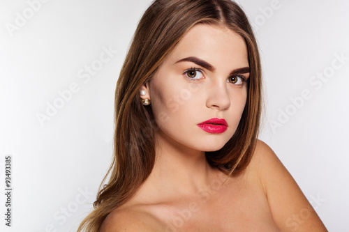 Face of girl with perfect skin and red lips