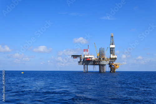 Offshore Jack Up Drilling Rig Over The Production Platform