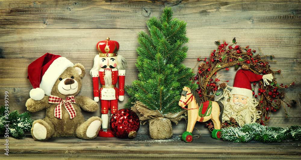 Christmas decoration. Vintage toys Teddy Bear, rocking horse Stock-Foto