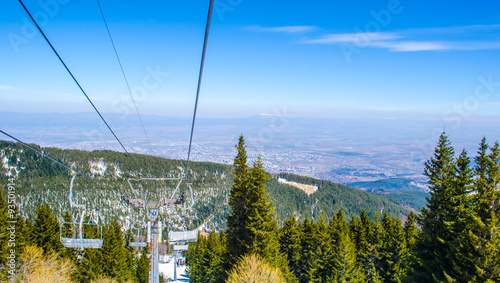 Vitosha mountain is situated juse next to the bulgarian capital sofia and every winter it becomes famous ski center and many skiers use a lift in order to ski - snowboard just minutes away from town.