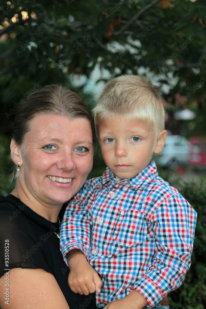 Happy mother and her son in the park Happy mother and her son in the park