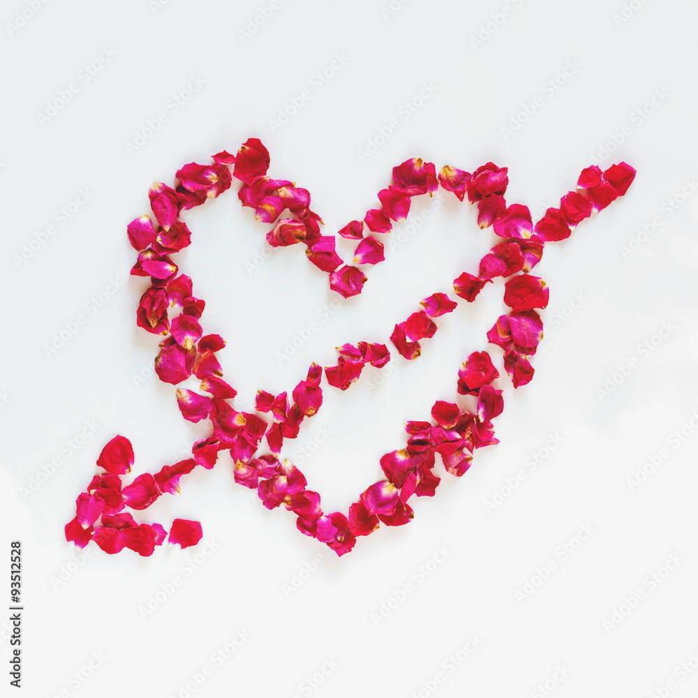 Heart with arrow made of rose petals Heart with arrow made of rose petals