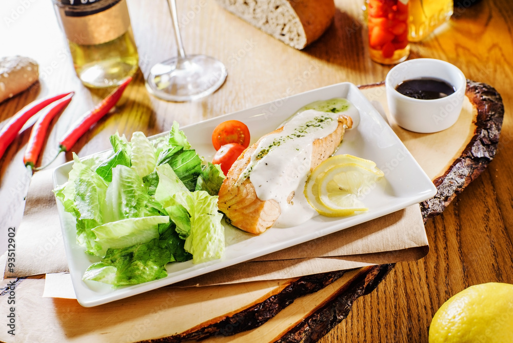 salmon steak with salad salmon steak with salad