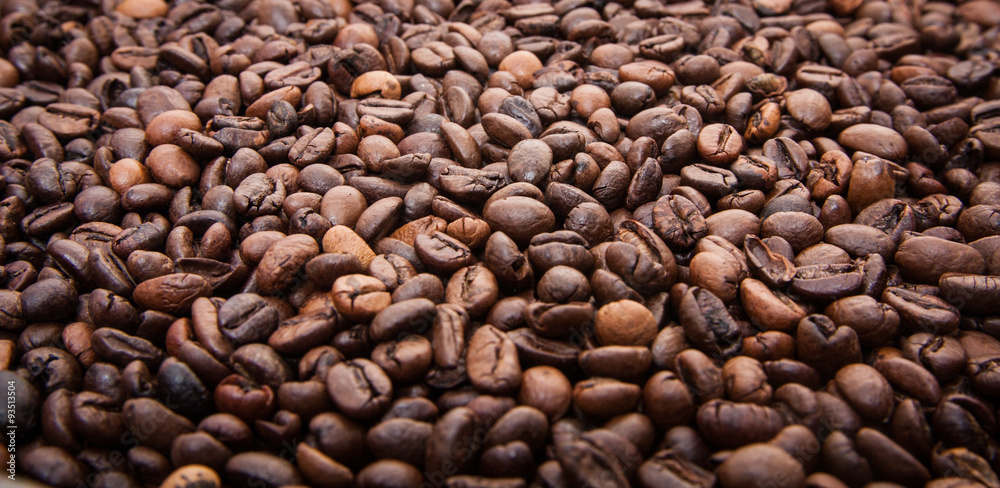 Fototapeta premium Roasted coffee beans background concept