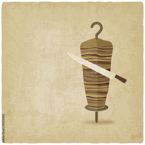 doner kebab with knife old background