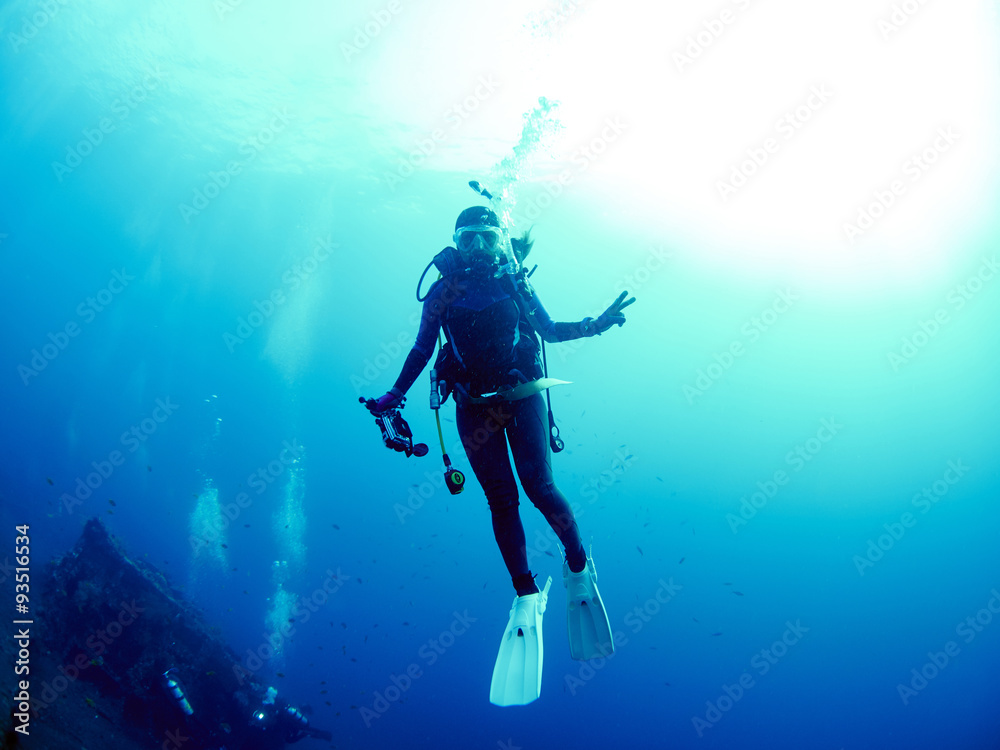 Fototapeta premium Scuba diver with coral