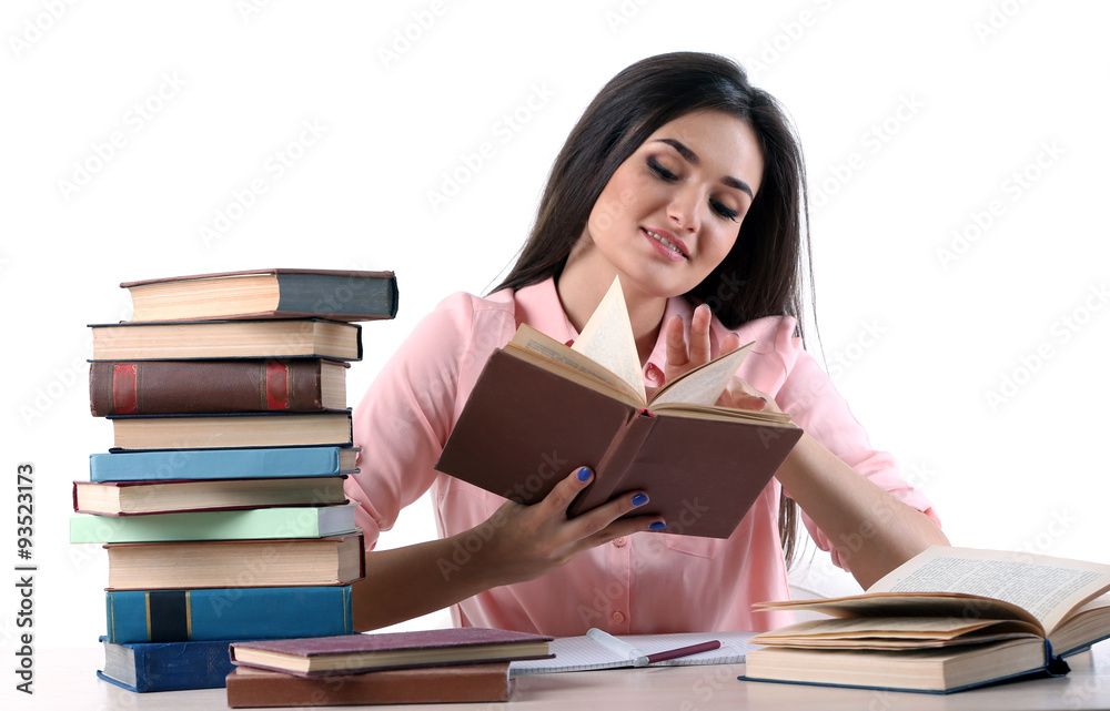 Young girl reading book isolated on white Young girl reading book isolated on white