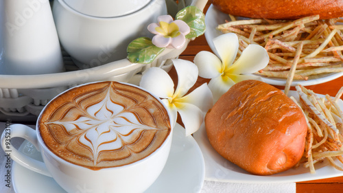 Cafe with sweet bun for breakfast