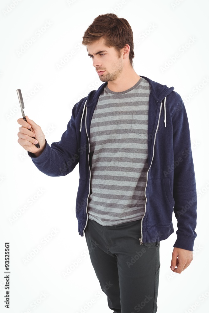 Man holding straight edge razor Man holding straight edge razor