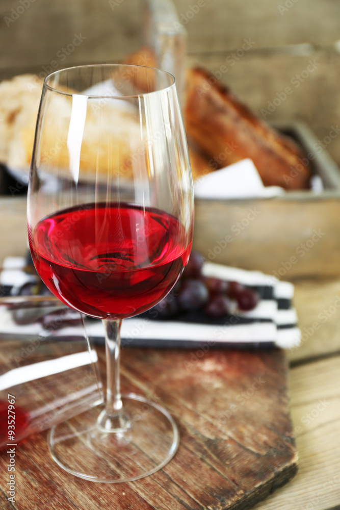 Still life of wine and bread on rustic wooden background Still life of wine and bread on rustic wooden background