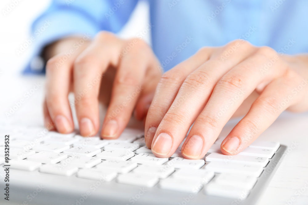 Female hands typing on keyboard close up Female hands typing on keyboard close up
