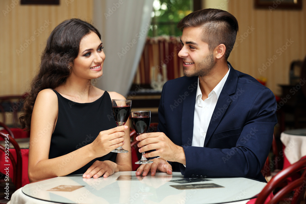 attractive young couple dating at the restaurant attractive young couple dating at the restaurant