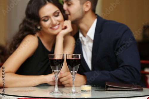 young couple flirting at th...