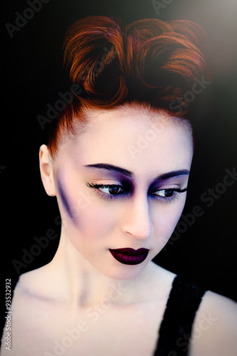 Beautiful redheaded woman face with bright make up