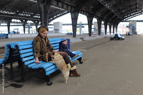 Obraz na płótnie Mom with son and dog travel by train w salonie