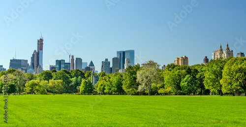 New York City Manhattan Central Park panorama in Autumn lake with newyork city skyline