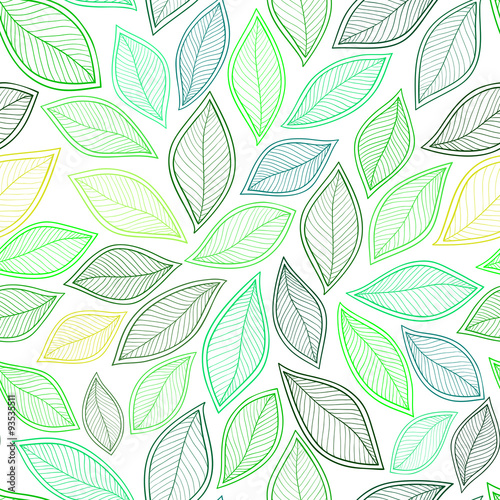 green autumn leaves on white background