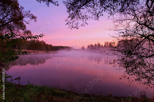 Pink sunrise on the lake © valentsova