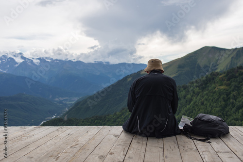 Traveler watching on mountains landscape  By Mestia  Georgia