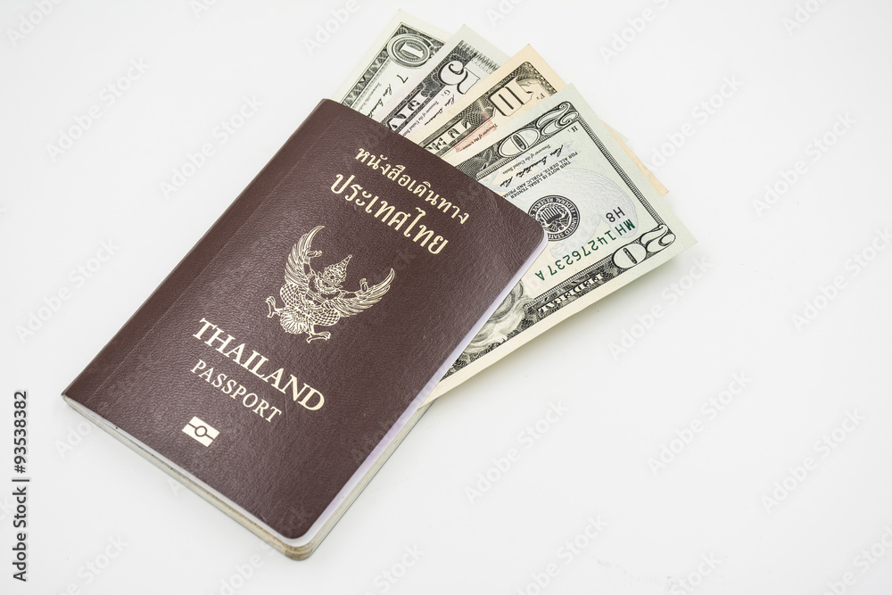 us dollar banknote with Thailand passport on white background.. us dollar banknote with Thailand passport on white background..
