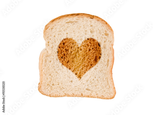 Heart toasted on a slice of bread, isolated on white background