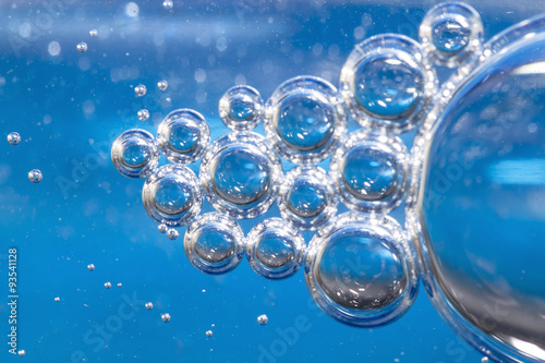 Blue bubbles in clear water.