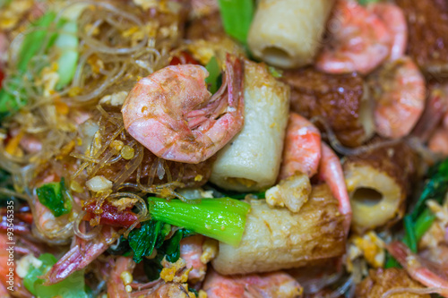 Shrimp fried vermicelli and vegetables close-up on the top view.