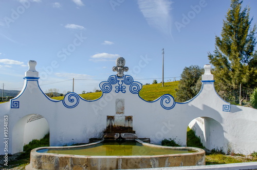 Fonte velha perto da vila de Arraiolos, Portugal photo