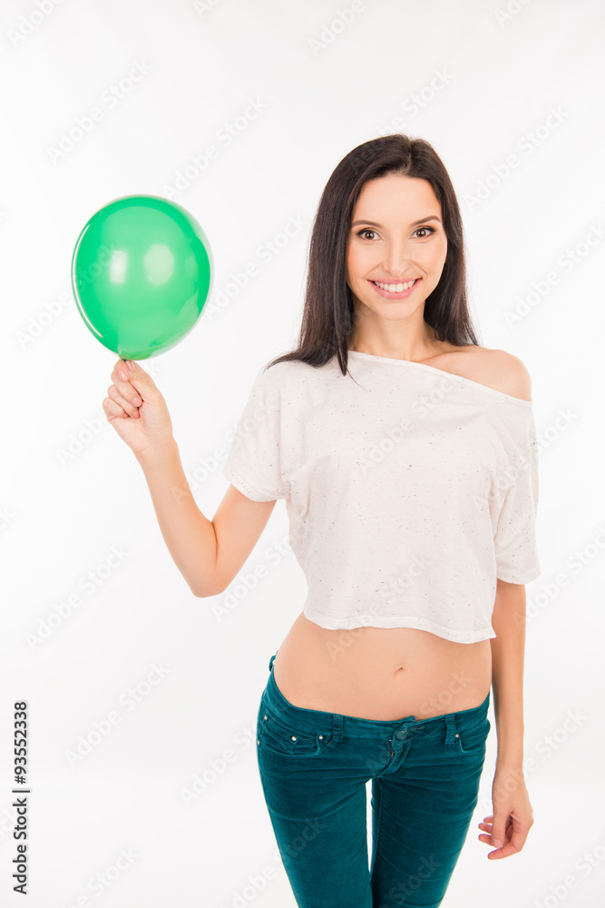 happy young woman with green balloon happy young woman with green balloon