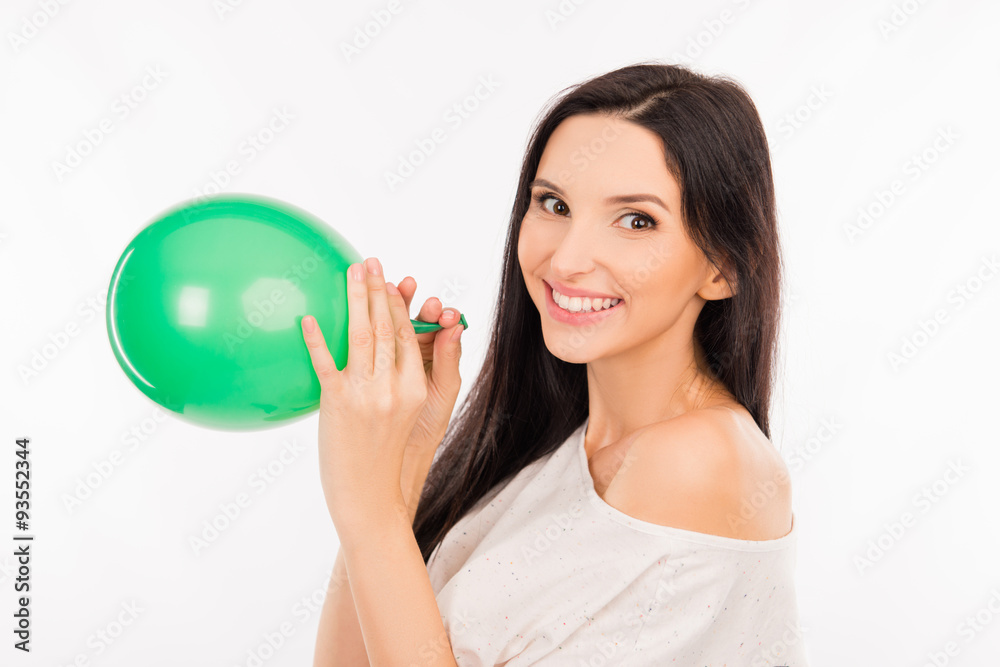 happy young woman with green balloon happy young woman with green balloon
