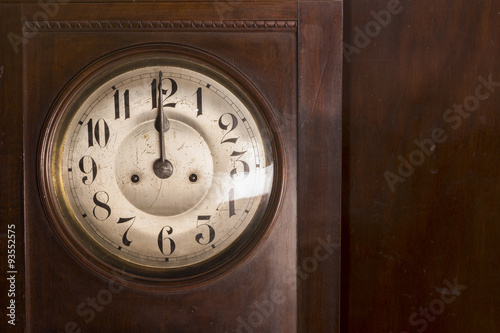 Closeup of an antique pendulum clock