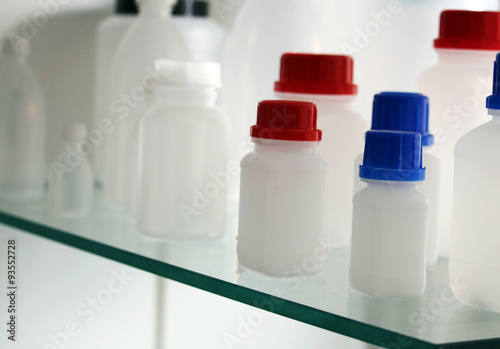 White laboratory plastic bottles for a medicine