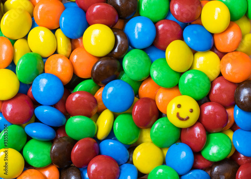 Smile face on colorful chocolate balls