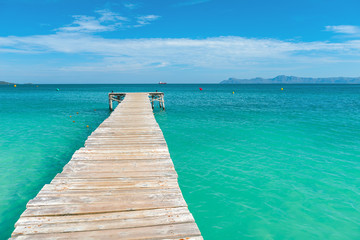 Wooden jetty in the turquoise sea of Mallorca - 7138
