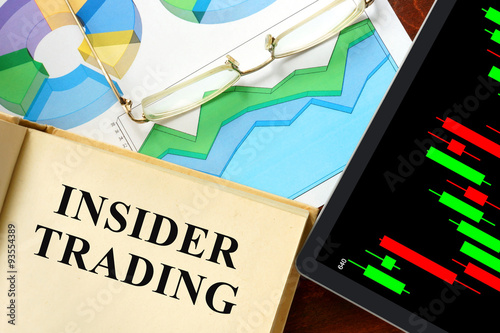 Obraz na plátně Words  written insider trading on a book. Business concept.