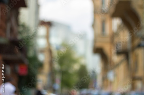 Obraz na płótnie Blurred background photo. Cityscape bokeh. Blurry european street w salonie