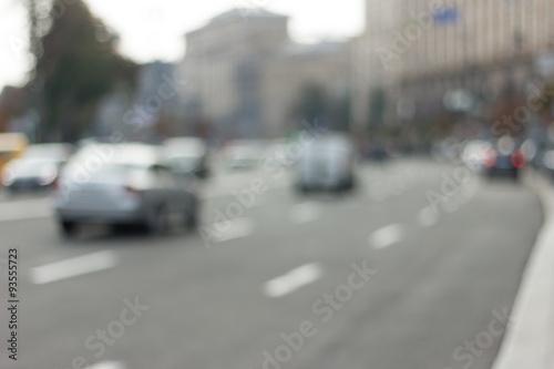 Blurred background photo. Cityscape bokeh. Blurry road