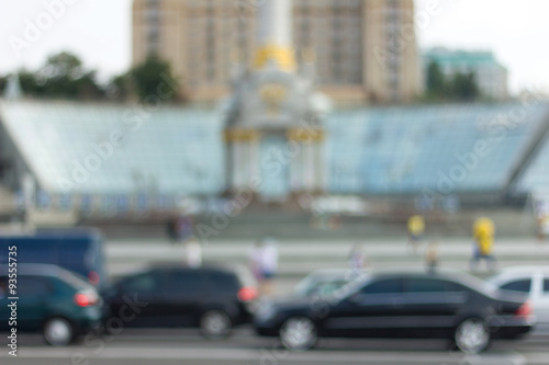 Blurred background photo. Cityscape bokeh. Blurry cars