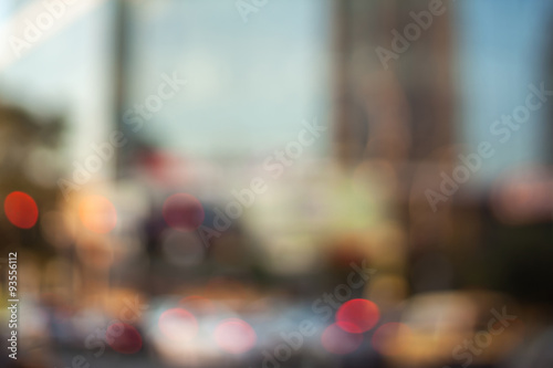 Blurred background photo.Cityscape bokeh. Defocused abstract city.Background out of focus.Can use as wallpaper, design. Summer blurry city backdrop.Travel out of focus photos. Fairy defocused photos. 