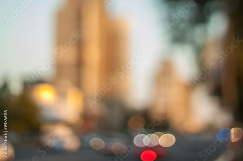 Blurred background photo.Cityscape bokeh. Defocused abstract city.Background out of focus.Can use as wallpaper, design. Summer blurry city backdrop.Travel out of focus photos. Fairy defocused photos. 