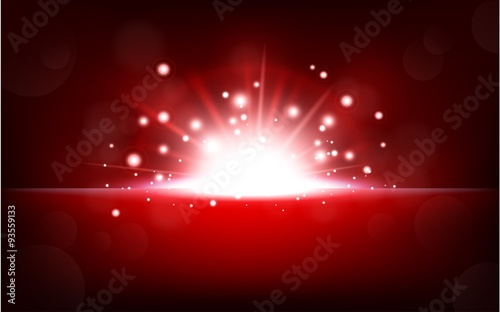 Bright red light rising from the black horizon