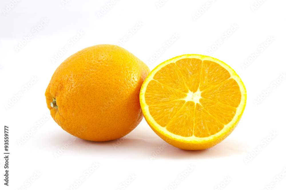 Pair of oranges on white background, one of them sliced in half