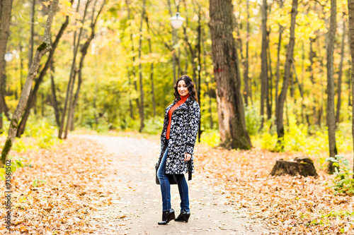 Beautiful woman in autumn park © satura_